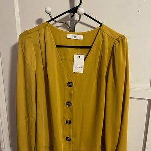 Elodie Mustard long sleeve button down blouse. NWT. Size XS